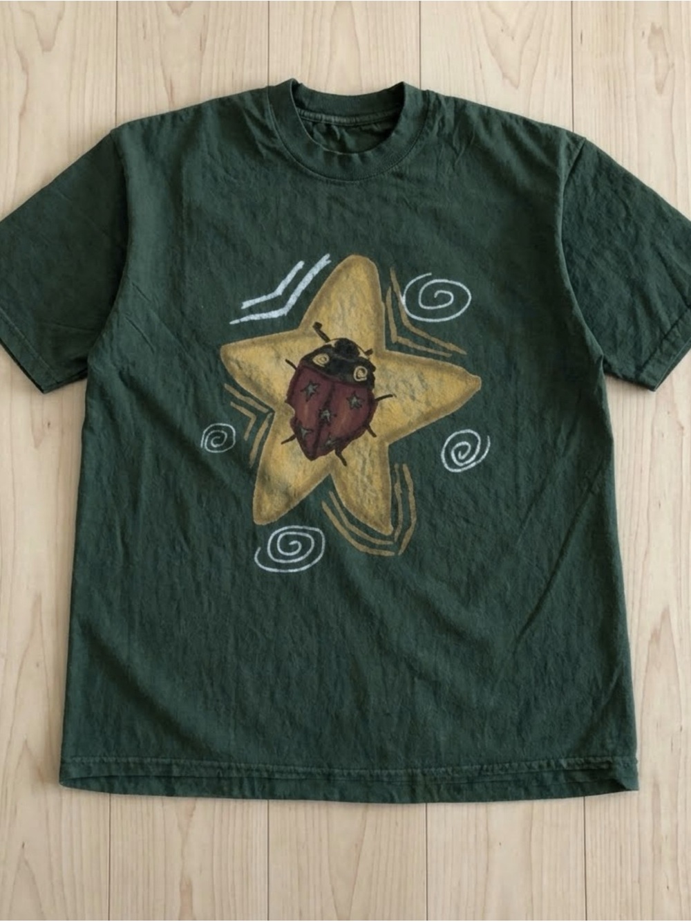 Gildan Forest Green Short Sleeve Tee with Gold Star and Red Ladybug Graphic